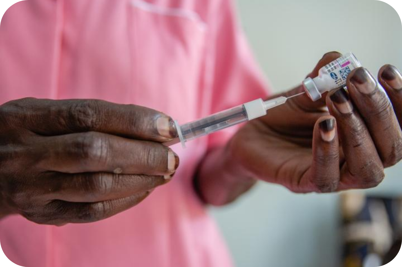 Nurse Margaret gives an injection to a client at Kawala Health Center IV in Uganda - Action Aid report